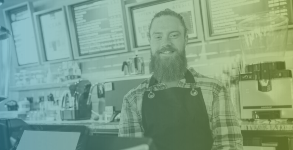 Image of a man behind a counter