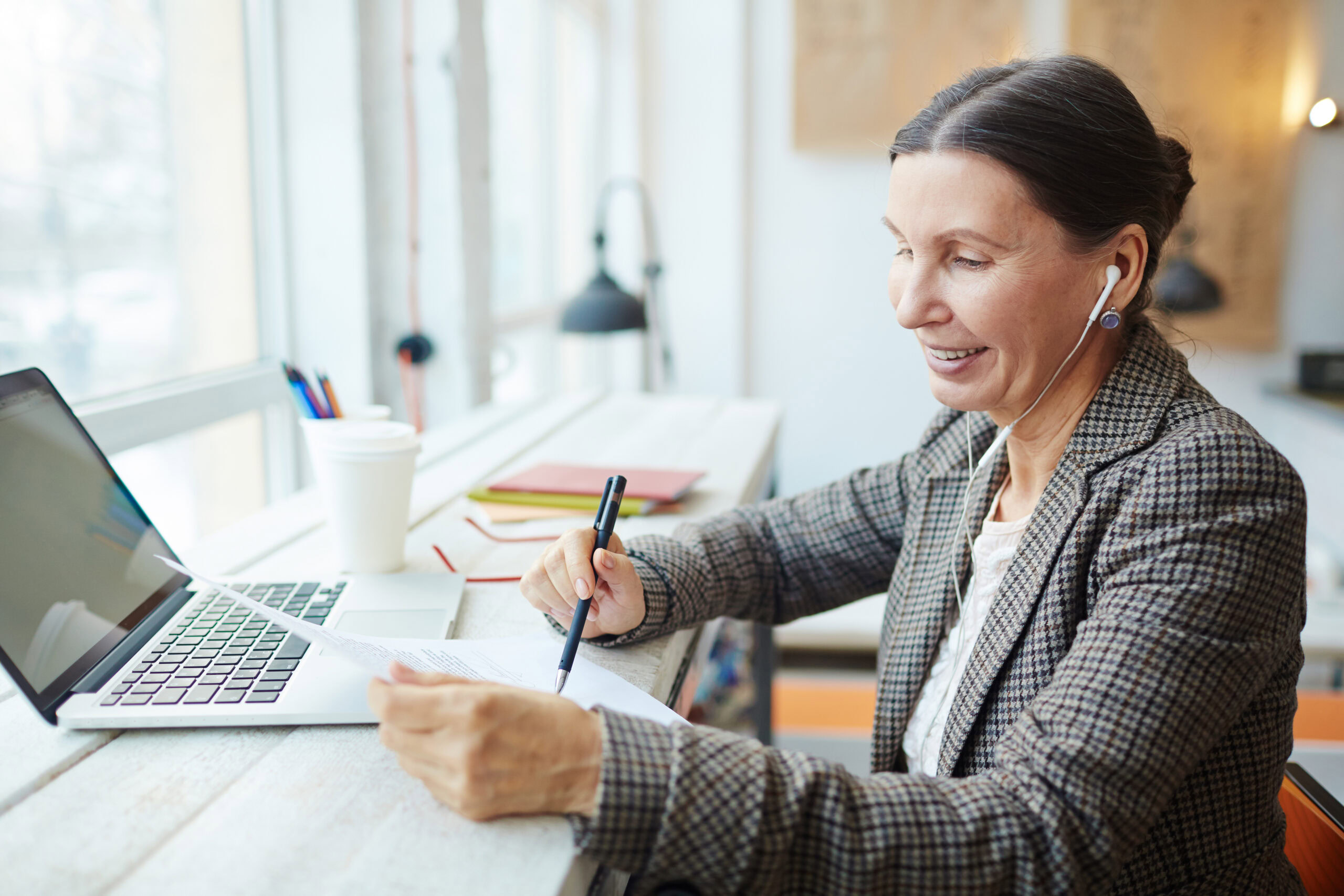 Image of professional woman on a laptop