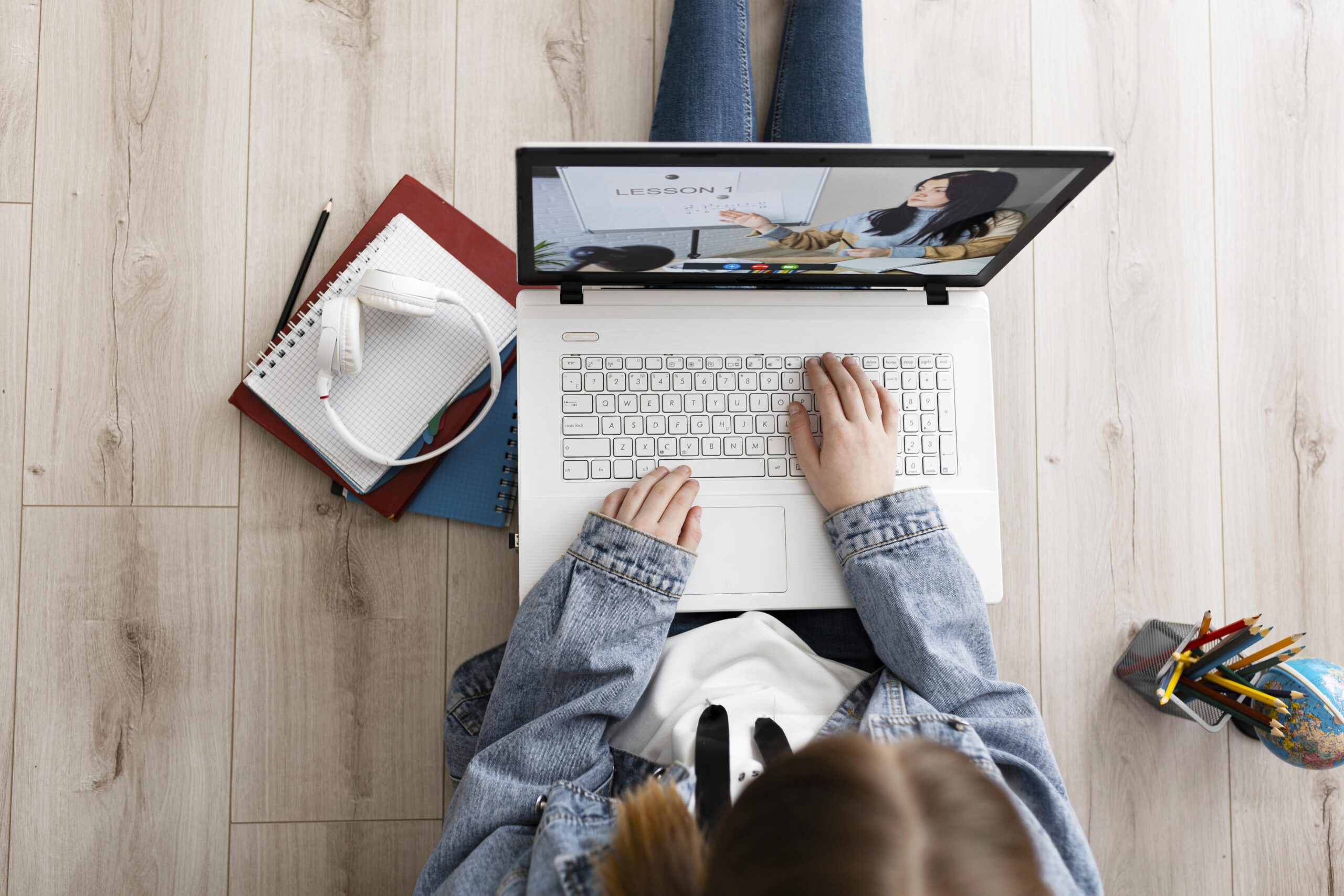 Top down image of girl on a laptop