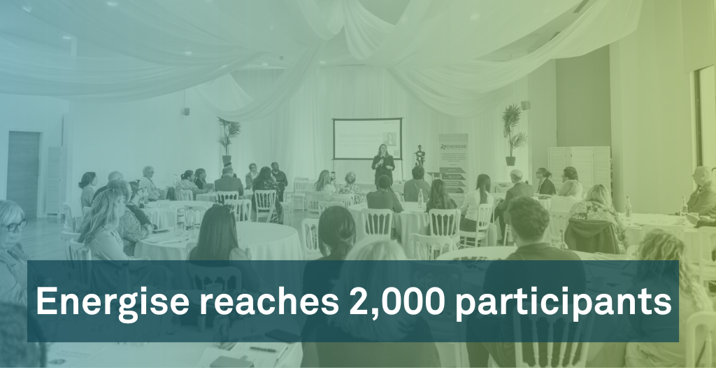 a photo of a room full of people with the words 'Energise 2,000 participants featured image'